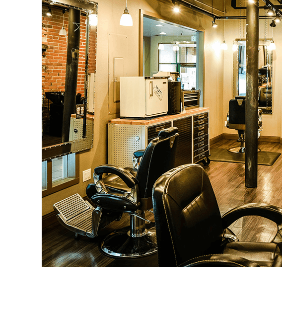 An image of the renovated Europa Salon, showcasing modern design elements and a welcoming atmosphere. The salon features sleek decor, comfortable seating areas, and ample natural lighting. S